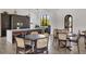 Modern community kitchen with seating at 249 Palmaria Ct, Nokomis, FL 34275