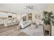 Spacious living room featuring modern finishes and seamless kitchen access at 249 Palmaria Ct, Nokomis, FL 34275