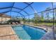 Inviting screened pool with plenty of space for relaxation at 249 Palmaria Ct, Nokomis, FL 34275