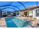 Inviting pool and screened patio with seating area, perfect for outdoor entertaining at 249 Palmaria Ct, Nokomis, FL 34275