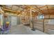 View of barn interior with stalls and additional storage space at 25205 67Th E Ave, Myakka City, FL 34251