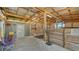 Clean and well-lit horse barn featuring multiple stalls, fans, and an open layout for easy access at 25205 67Th E Ave, Myakka City, FL 34251