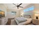 Bright bedroom features a ceiling fan, large window and custom decor at 25205 67Th E Ave, Myakka City, FL 34251
