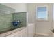 Custom laundry room features tile surround dog washing station, and modern washer dryer at 25205 67Th E Ave, Myakka City, FL 34251