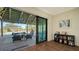 Spacious indoor/outdoor living concept featuring brick paved patio with built-in fire pit at 25205 67Th E Ave, Myakka City, FL 34251