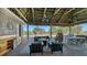 Relaxing backyard with a patio featuring a pool, lounge area, and bar at 25205 67Th E Ave, Myakka City, FL 34251