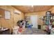 Organized tack room with saddle racks, shelving, and storage solutions for equestrian equipment and supplies at 25205 67Th E Ave, Myakka City, FL 34251