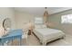 Serene bedroom with a queen-size bed and a desk at 308 46Th W St, Bradenton, FL 34209