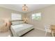 Spacious bedroom with a king-size bed and calming decor at 308 46Th W St, Bradenton, FL 34209