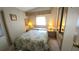 Cozy bedroom with double bed and mirrored closet at 3333 26Th E Ave # 1195, Bradenton, FL 34208