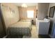 Bedroom with a double bed and in-unit laundry at 3333 26Th E Ave # 1195, Bradenton, FL 34208