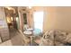 Small dining area with a round table and three chairs at 3333 26Th E Ave # 1195, Bradenton, FL 34208