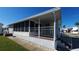 Mobile home with covered porch and yard at 3333 26Th E Ave # 1195, Bradenton, FL 34208