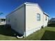 View of the mobile home's side and back exterior at 3333 26Th E Ave # 1195, Bradenton, FL 34208