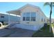 Charming home with a covered porch and well-manicured lawn at 3333 26Th E Ave # 1195, Bradenton, FL 34208