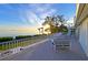 Large deck with sunset views and comfortable seating at 3804 Bayside Dr, Bradenton, FL 34210