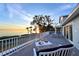Expansive deck boasting sunset views and outdoor seating at 3804 Bayside Dr, Bradenton, FL 34210
