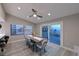 Dining room with water views and sliding glass doors at 3804 Bayside Dr, Bradenton, FL 34210