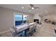 Bright dining room featuring hardwood floors and water views at 3804 Bayside Dr, Bradenton, FL 34210