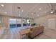 Bright living room featuring water views and hardwood floors at 3804 Bayside Dr, Bradenton, FL 34210