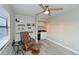Cozy office features built-in shelving, a comfortable chair, and a wet bar at 3804 Bayside Dr, Bradenton, FL 34210