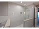 Large walk-in shower with marble tile and glass enclosure at 3804 Bayside Dr, Bradenton, FL 34210