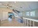 Open loft area with high ceilings and hardwood floors at 3804 Bayside Dr, Bradenton, FL 34210