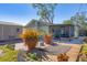 Spacious backyard deck with potted plants and a shed at 3931 Longhorn Dr, Sarasota, FL 34233