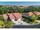 Aerial view of two-story home and community at 4002 Wilshire E Cir # 90, Sarasota, FL 34238