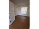 Bedroom with wood flooring and double door closet at 4042 Kingsfield Dr, Parrish, FL 34219