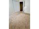 Spacious bedroom featuring carpet floors and double door closet at 4042 Kingsfield Dr, Parrish, FL 34219