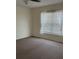 Spacious bedroom with neutral walls, carpet flooring, and a ceiling fan at 4042 Kingsfield Dr, Parrish, FL 34219