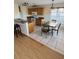 Eat-in kitchen with wood cabinets, granite countertops, and stainless steel appliances at 4042 Kingsfield Dr, Parrish, FL 34219
