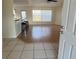 Bright living room with laminate wood floors and a view at 4042 Kingsfield Dr, Parrish, FL 34219