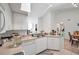 Modern kitchen with white cabinetry and a dishwasher at 4140 Central Sarasota Pkwy # 1233, Sarasota, FL 34238