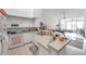 Well-equipped kitchen with island and living room view at 4140 Central Sarasota Pkwy # 1233, Sarasota, FL 34238