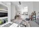 Open living room showcasing a gray sectional and wood floors at 4140 Central Sarasota Pkwy # 1233, Sarasota, FL 34238