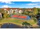 Community tennis court near residential building at 4140 Central Sarasota Pkwy # 1233, Sarasota, FL 34238