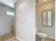 Bathroom with tile floors, a stand up shower, and a separate water closet at 4440 Tatum St, Port Charlotte, FL 33948