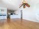 Open-concept space featuring hardwood floors and bright lighting at 4440 Tatum St, Port Charlotte, FL 33948