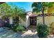 Inviting condo exterior with lush landscaping and a covered entryway at 4644 Red Maple Rd # 1303, Bradenton, FL 34210