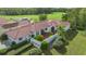 Luxury home with tile roof, situated on a golf course at 6602 Seven Pines Dr, Bradenton, FL 34203