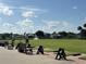 Golf course driving range with benches and hitting stations at 6713 Stone River Rd # 205, Bradenton, FL 34203