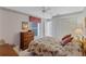 Cozy bedroom featuring a queen-size bed and built-in wardrobe at 6713 Stone River Rd # 205, Bradenton, FL 34203