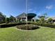 Elegant community clubhouse with landscaping at 6713 Stone River Rd # 205, Bradenton, FL 34203