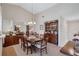 Formal dining room featuring a wooden table and hutch at 6713 Stone River Rd # 205, Bradenton, FL 34203