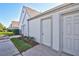 Exterior view showing a private entrance and well-maintained landscaping at 6713 Stone River Rd # 205, Bradenton, FL 34203