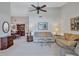Bright and airy living room featuring neutral tones and ample natural light at 6713 Stone River Rd # 205, Bradenton, FL 34203