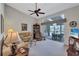 Spacious living room with access to a private balcony and lots of natural light at 6713 Stone River Rd # 205, Bradenton, FL 34203