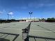 Community tennis courts provide ample space for recreation at 6713 Stone River Rd # 205, Bradenton, FL 34203